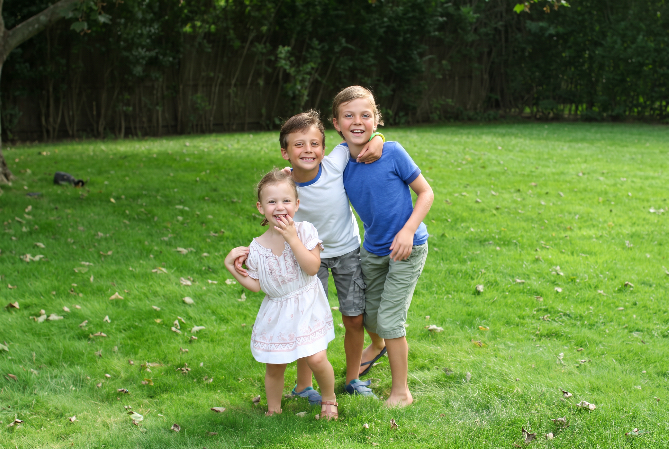 Stella and her brothers as children playing outside